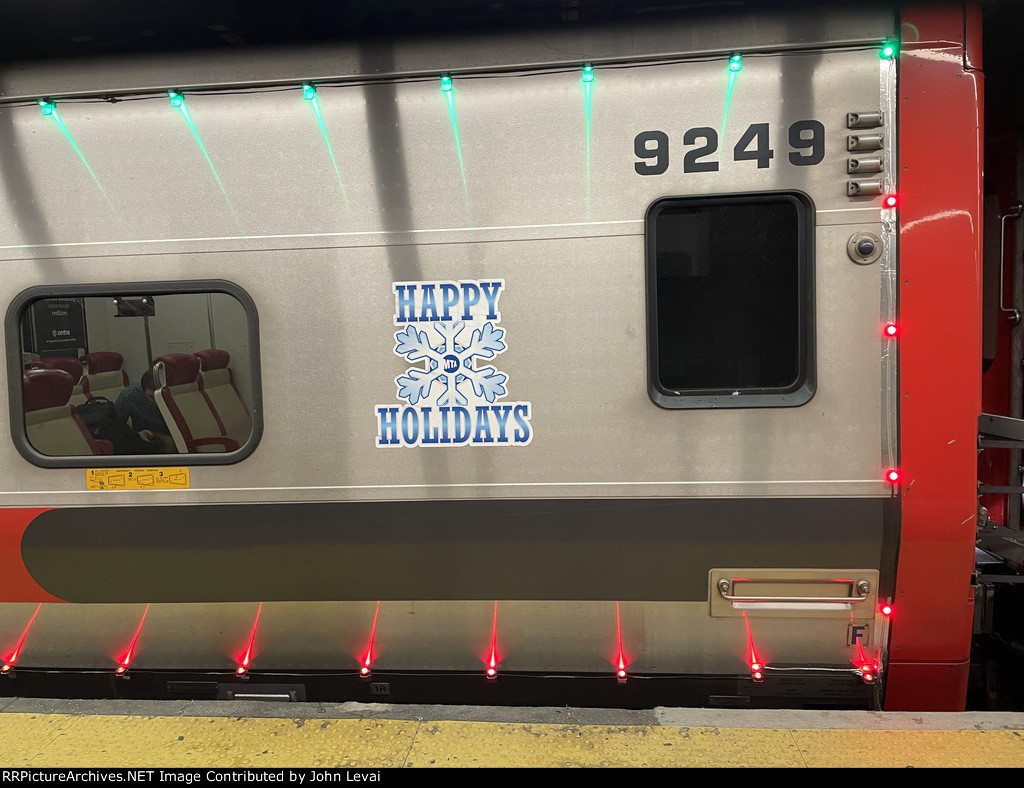 M8 Coach # 9249 with Happy Holidays MTA logo